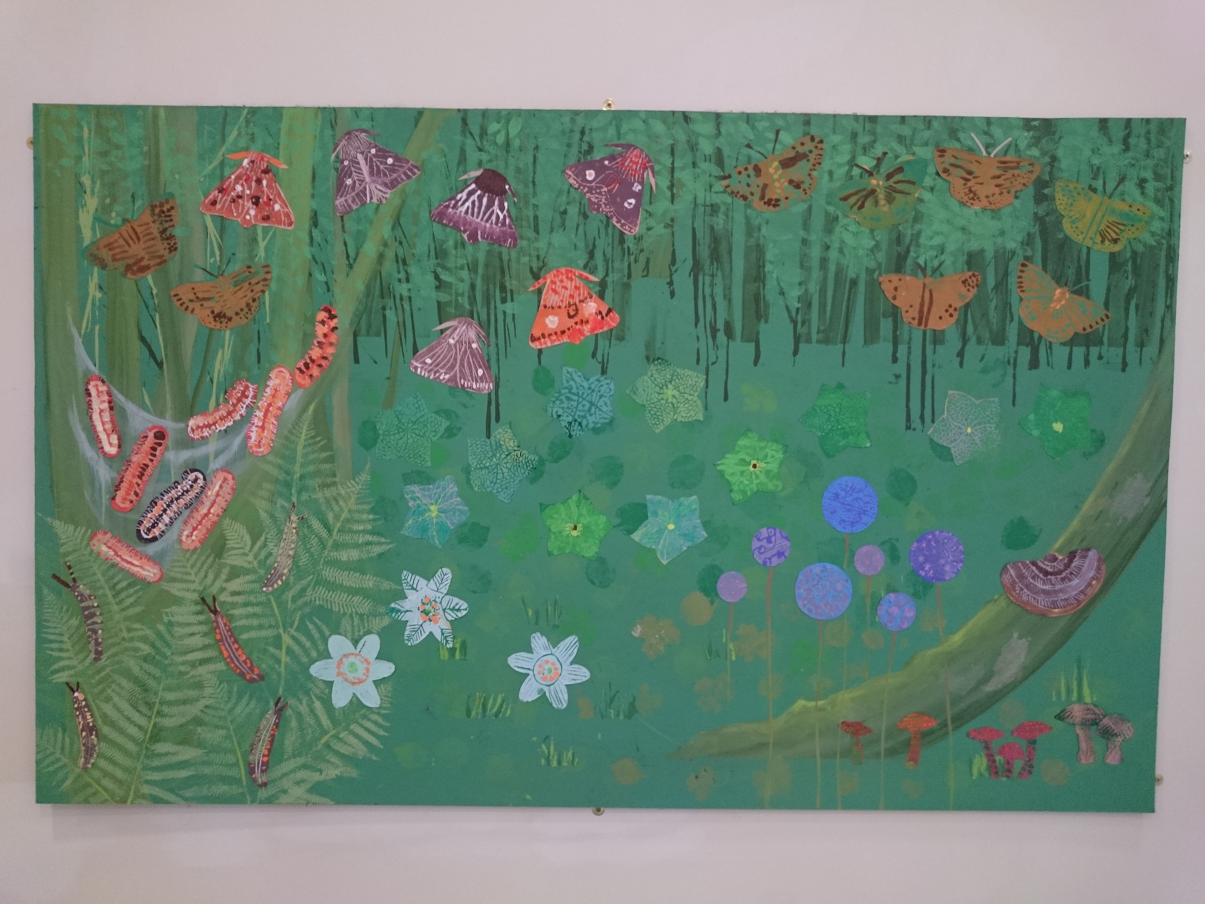 Colourful collage artwork created by children. Inspired by natural habitats